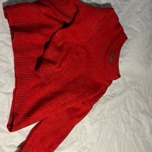 Fun red cozy sweater. Says it’s a medium but can fit up to 2x.